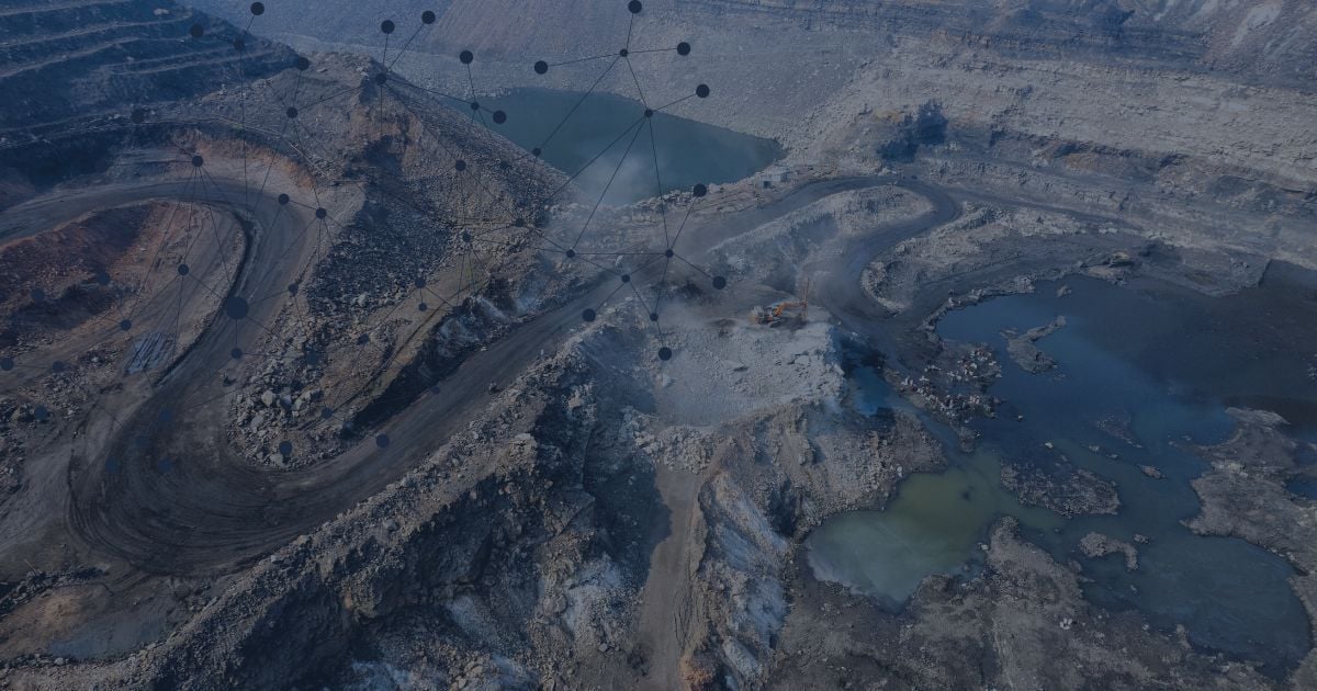 Aerial view of an open-pit mine with haul roads and water-filled depressions, overlaid with a connected data network graphic representing smart mining integration