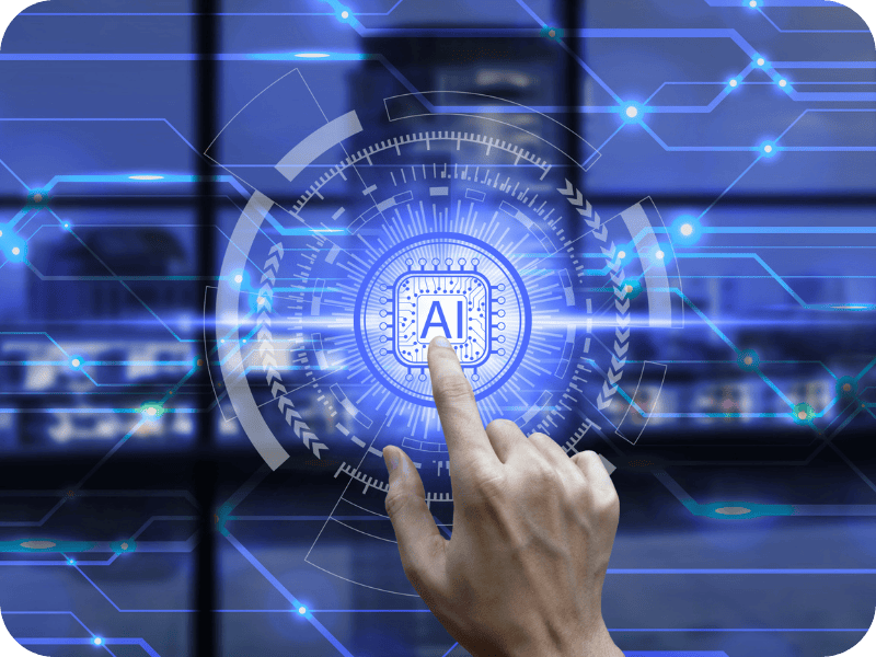 Hand interacting with a digital AI interface on a transparent screen, symbolizing human-AI collaboration in industrial systems
